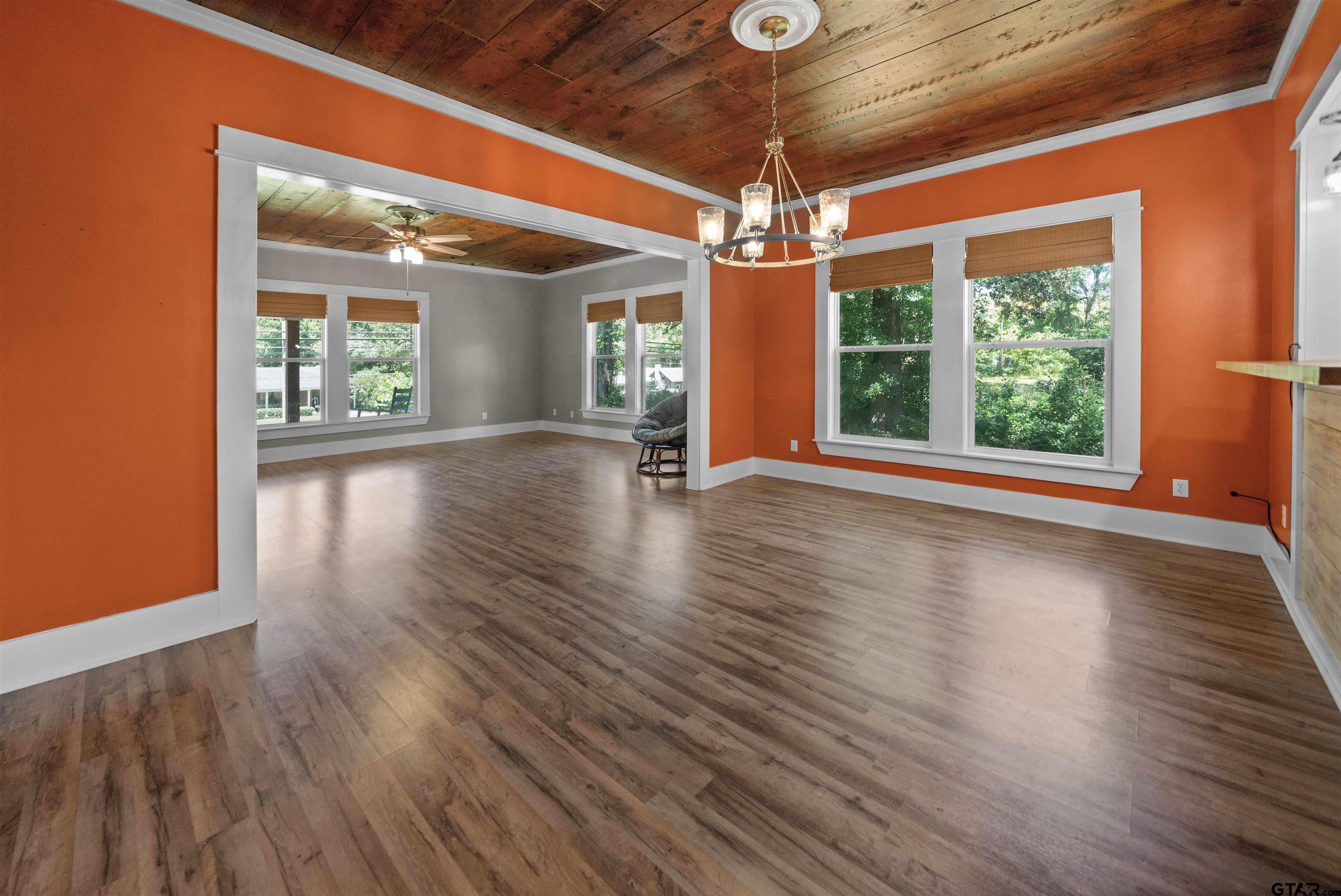 230 North Henderson Street Rusk, TX 75785 - Photo 12 of 34 a view of an empty room with wooden floor and a window