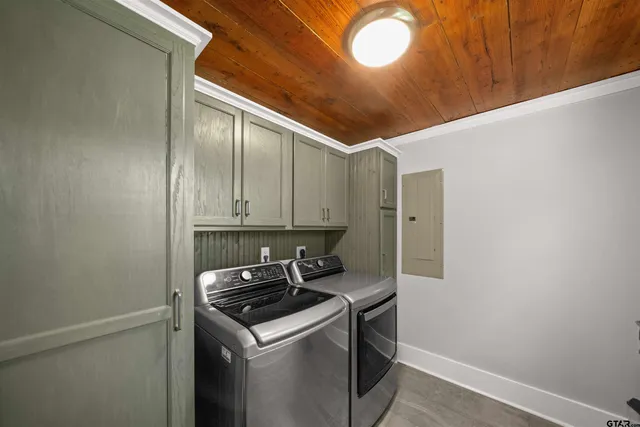 a view of storage and utility room with washer and dryer