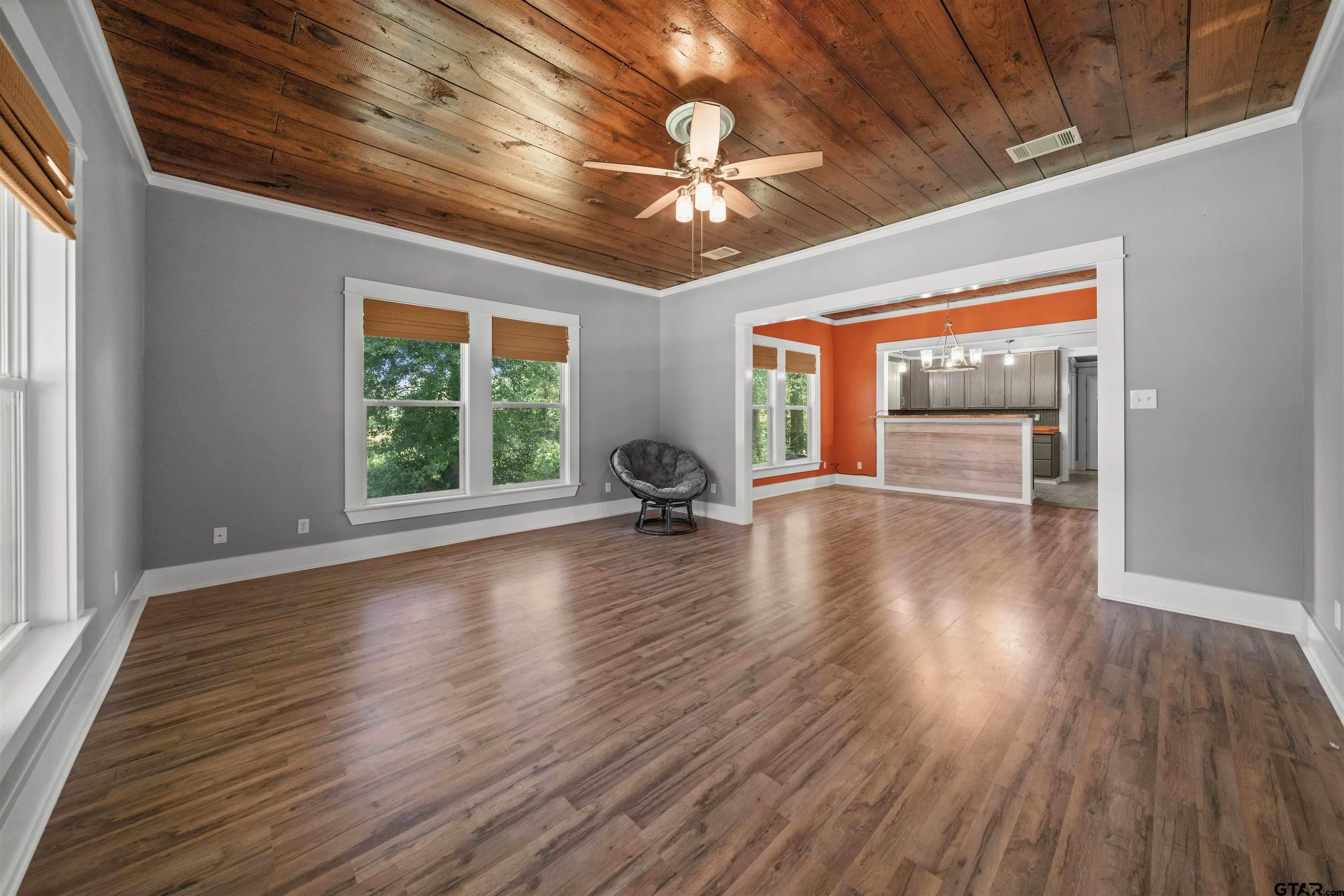 230 North Henderson Street Rusk, TX 75785 - Photo 17 of 34 a view of a livingroom with wooden floor and furniture