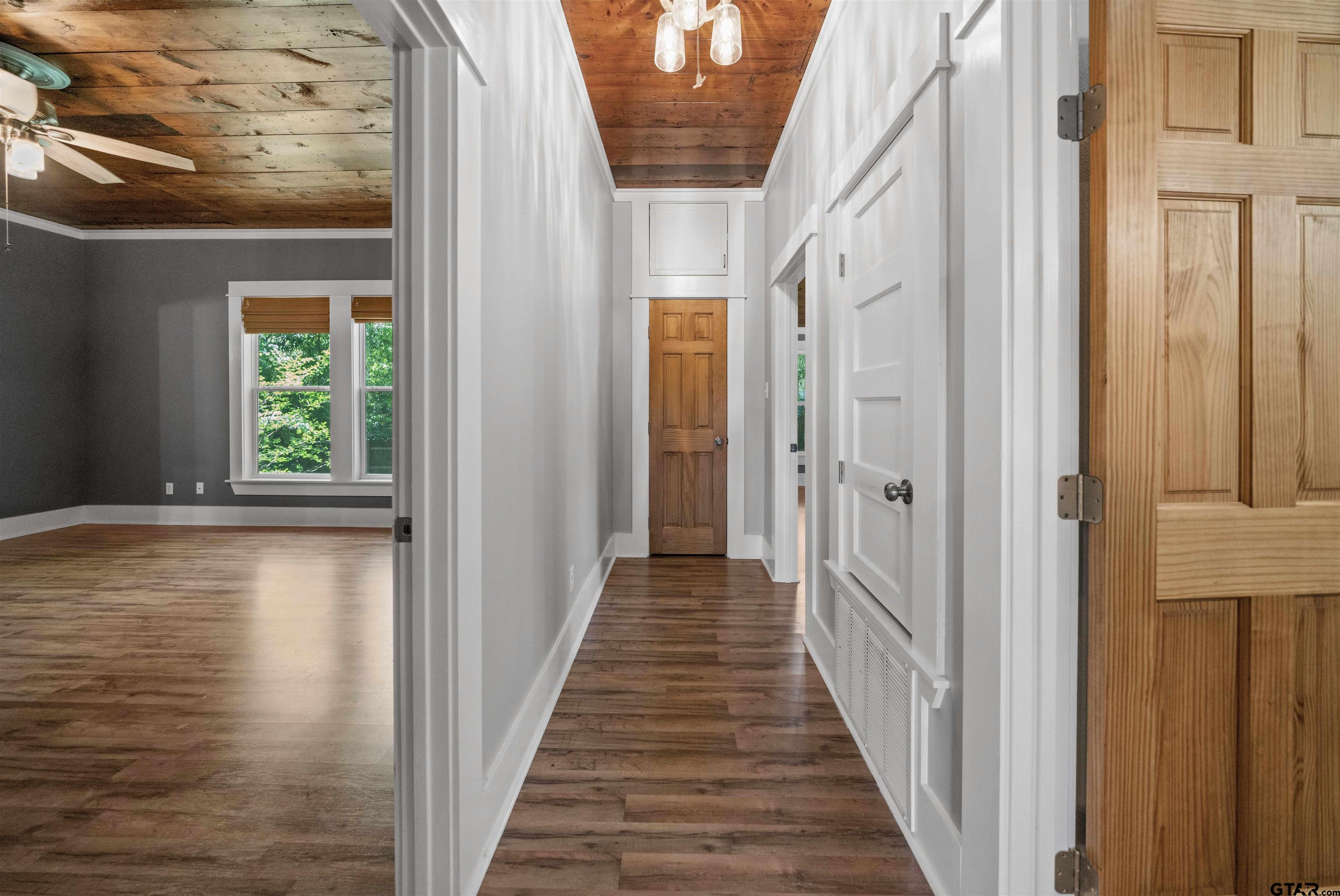 230 North Henderson Street Rusk, TX 75785 - Photo 26 of 34 a view of a hallway with wooden floor and staircase