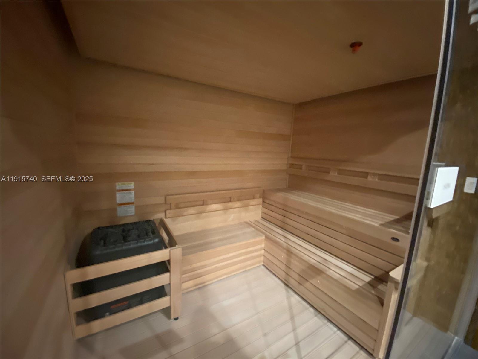 2000 Metropica Way, Unit 2104 Sunrise, FL 33323 - Photo 24 of 62 a bathroom with a sink and a mirror