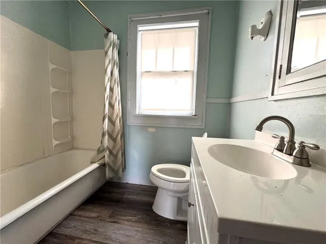 a bathroom with a sink and a toilet
