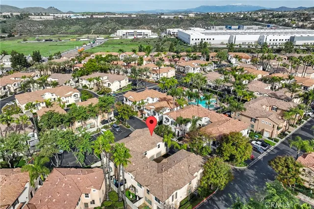an aerial view of a city with lots of residential buildings