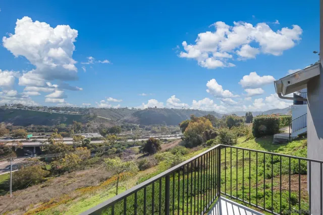 a view of a city from a balcony