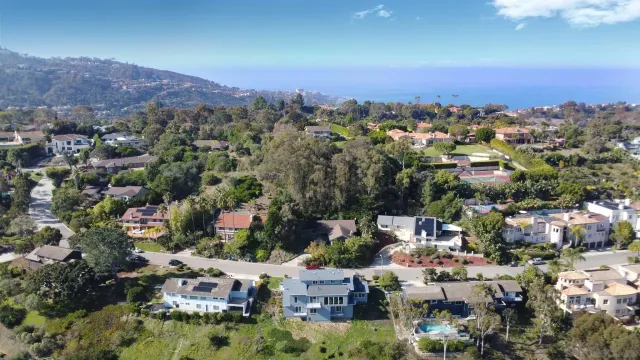a aerial view of multiple house