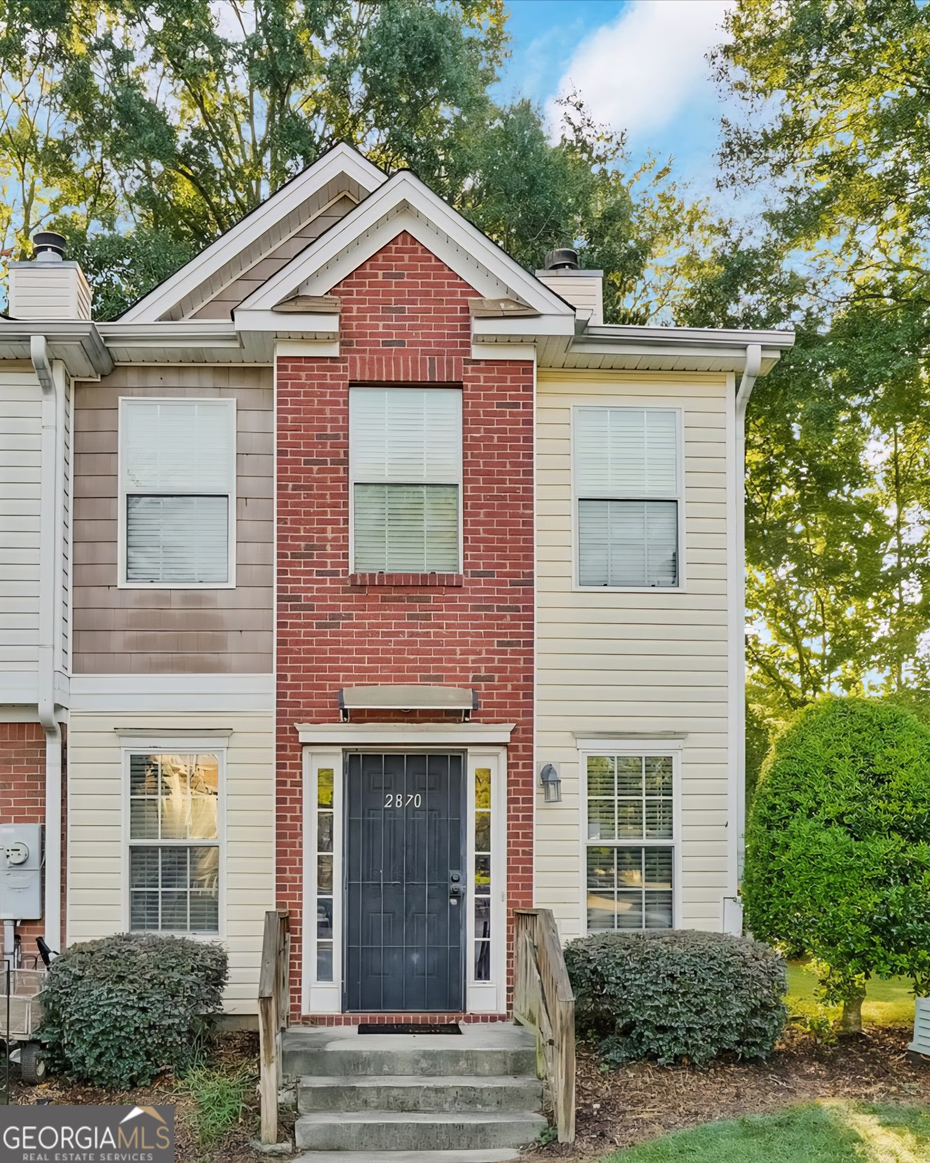 2870 Vining Ridge Terrace Decatur, GA 30034 - Photo 1 of 34 a front view of a house with garden