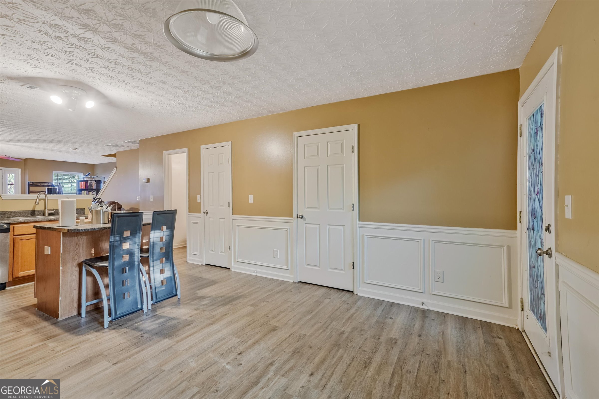 2870 Vining Ridge Terrace Decatur, GA 30034 - Photo 13 of 34 a view of a dining room with furniture and wooden floor