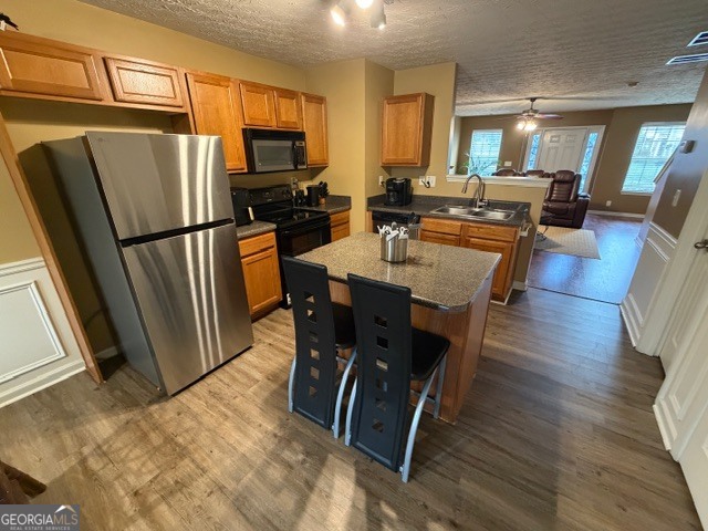2870 Vining Ridge Terrace Decatur, GA 30034 - Photo 14 of 34 a view of a dining room with furniture a rug and wooden floor