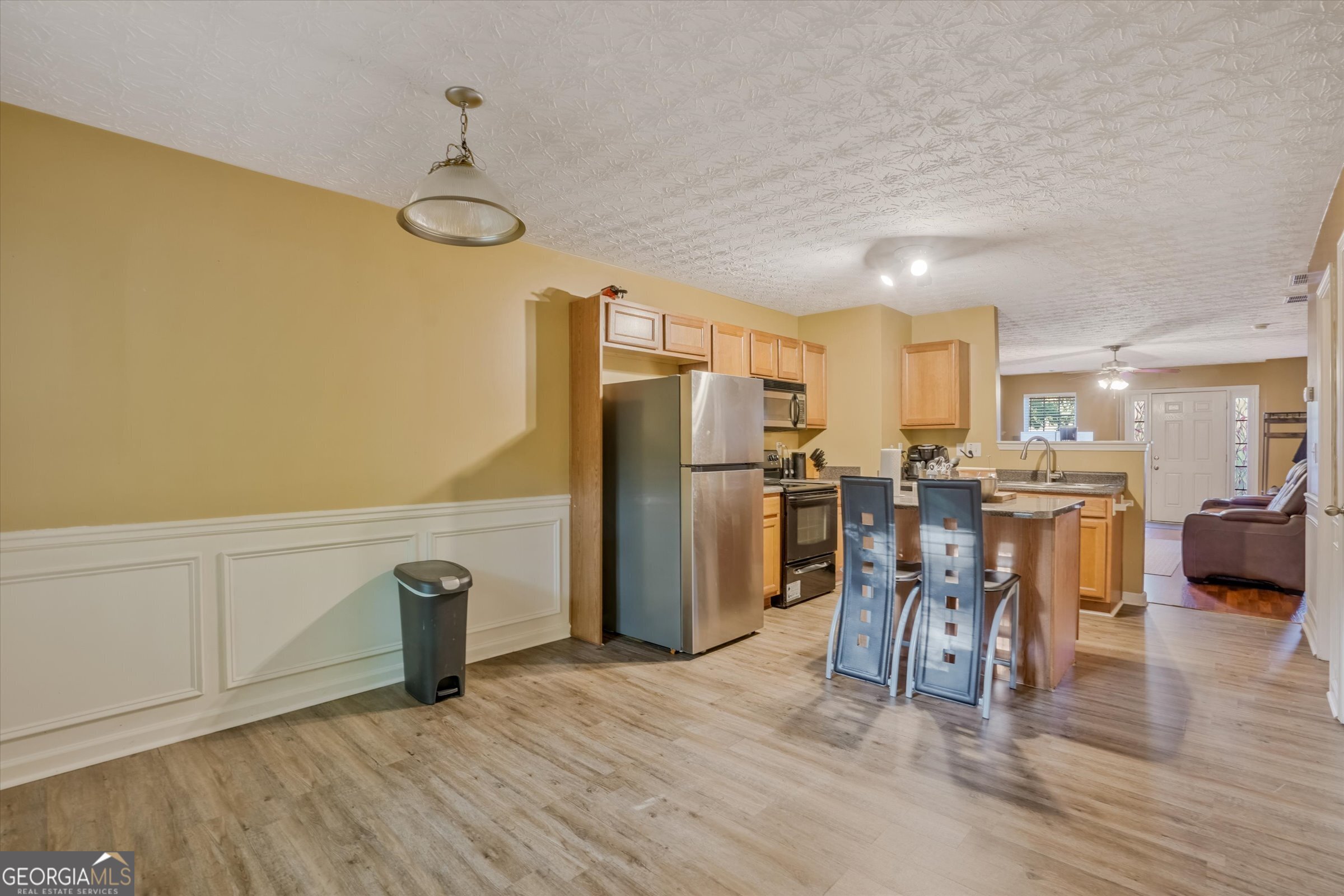 2870 Vining Ridge Terrace Decatur, GA 30034 - Photo 15 of 34 a kitchen with refrigerator and chairs