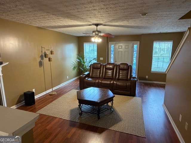 2870 Vining Ridge Terrace Decatur, GA 30034 - Photo 5 of 34 a living room with furniture a chandelier and a wooden floor