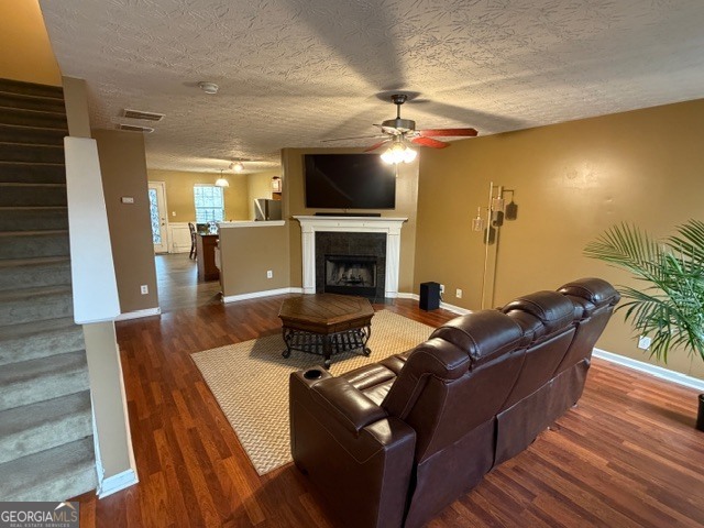 2870 Vining Ridge Terrace Decatur, GA 30034 - Photo 6 of 34 a living room with furniture a flat screen tv and a fireplace