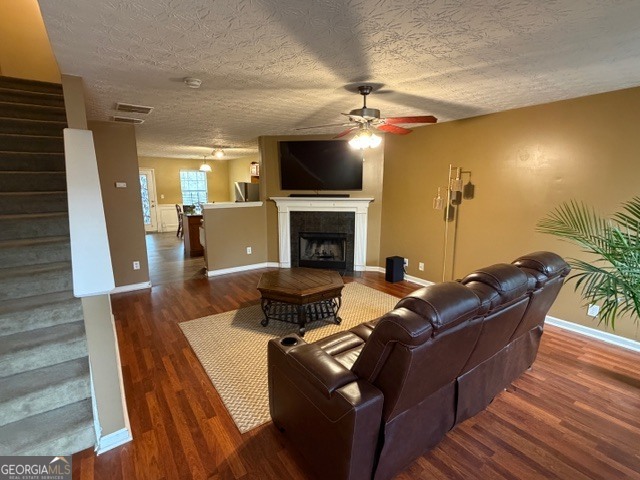 2870 Vining Ridge Terrace Decatur, GA 30034 - Photo 9 of 34 a living room with furniture a flat screen tv and a fireplace