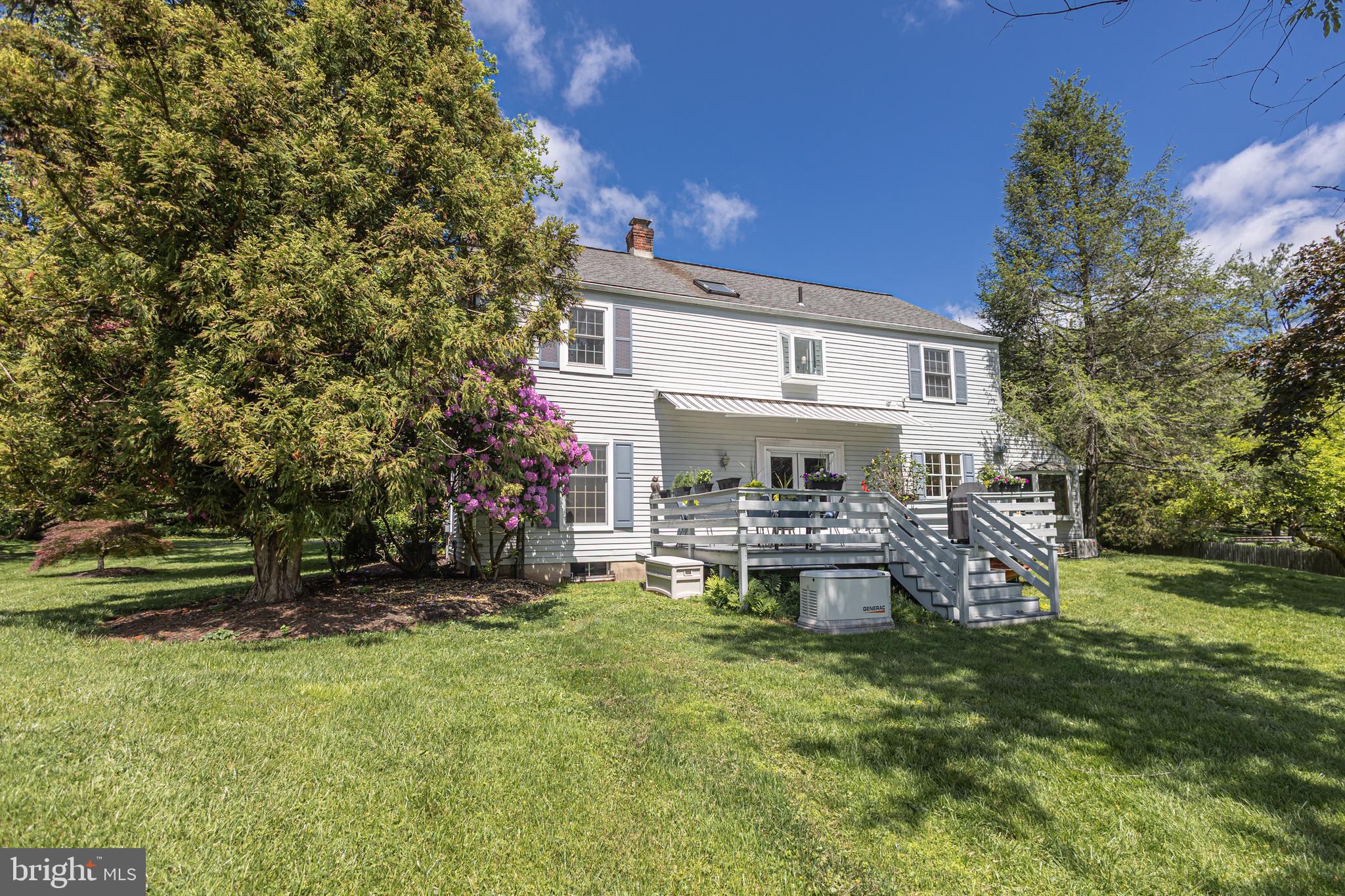 3048 Aquetong Road New Hope, PA 18938 - Photo 25 of 30 a view of a house with backyard and sitting area