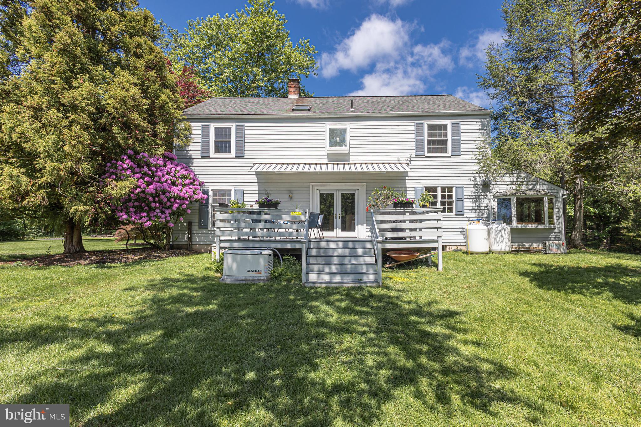 3048 Aquetong Road New Hope, PA 18938 - Photo 26 of 30 a view of a house with a yard porch and sitting area