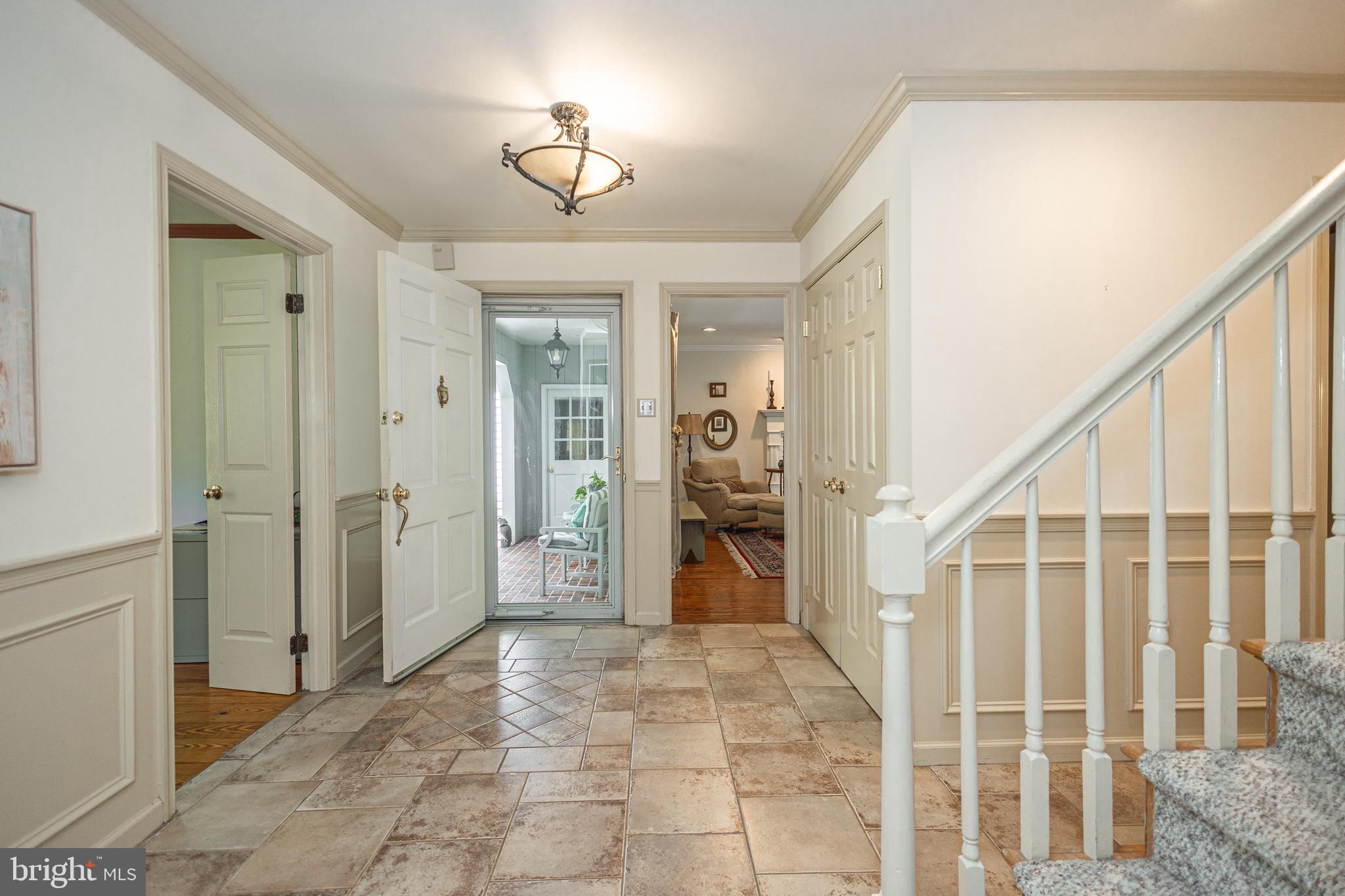 3048 Aquetong Road New Hope, PA 18938 - Photo 7 of 30 a view of a hallway with wooden floor and workspace