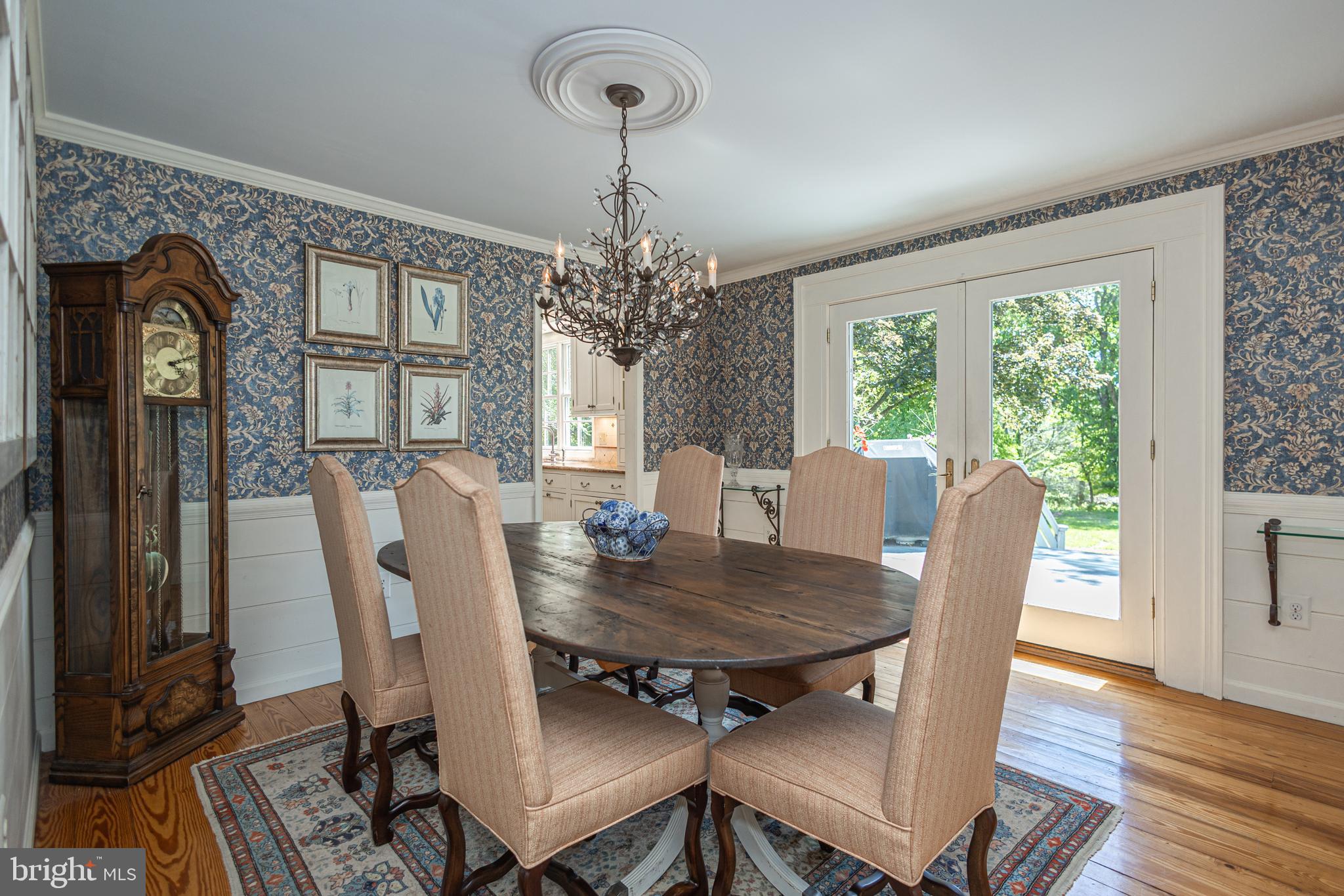 3048 Aquetong Road New Hope, PA 18938 - Photo 8 of 30 a view of a dining room with furniture window and wooden floor
