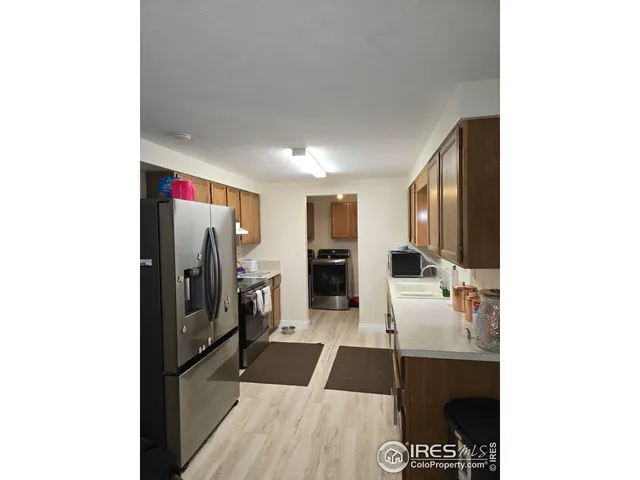 a view of a living room with a flat screen tv