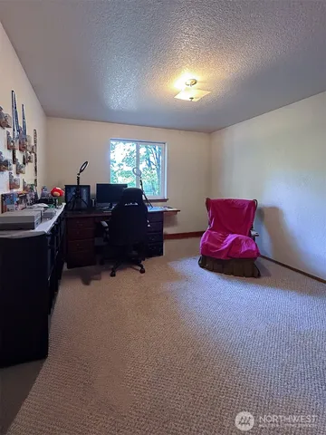 a room with furniture and a window