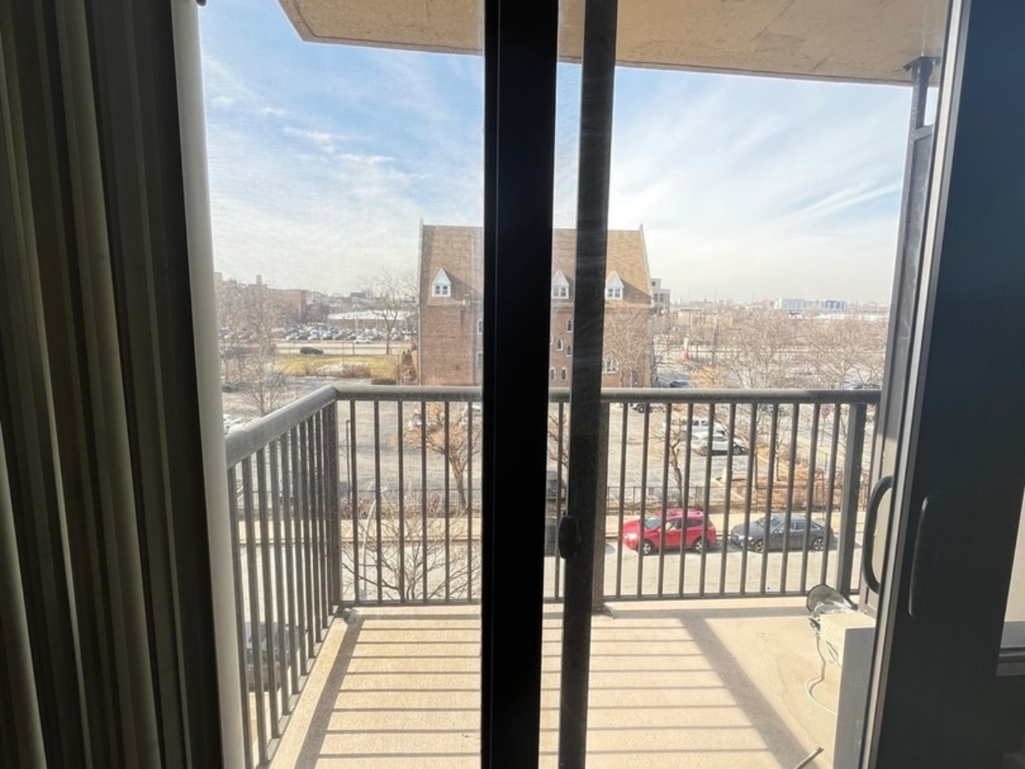 2605 South Indiana Avenue, Unit 301 Chicago, IL 60616 - Photo 14 of 23 a view of a city from a window
