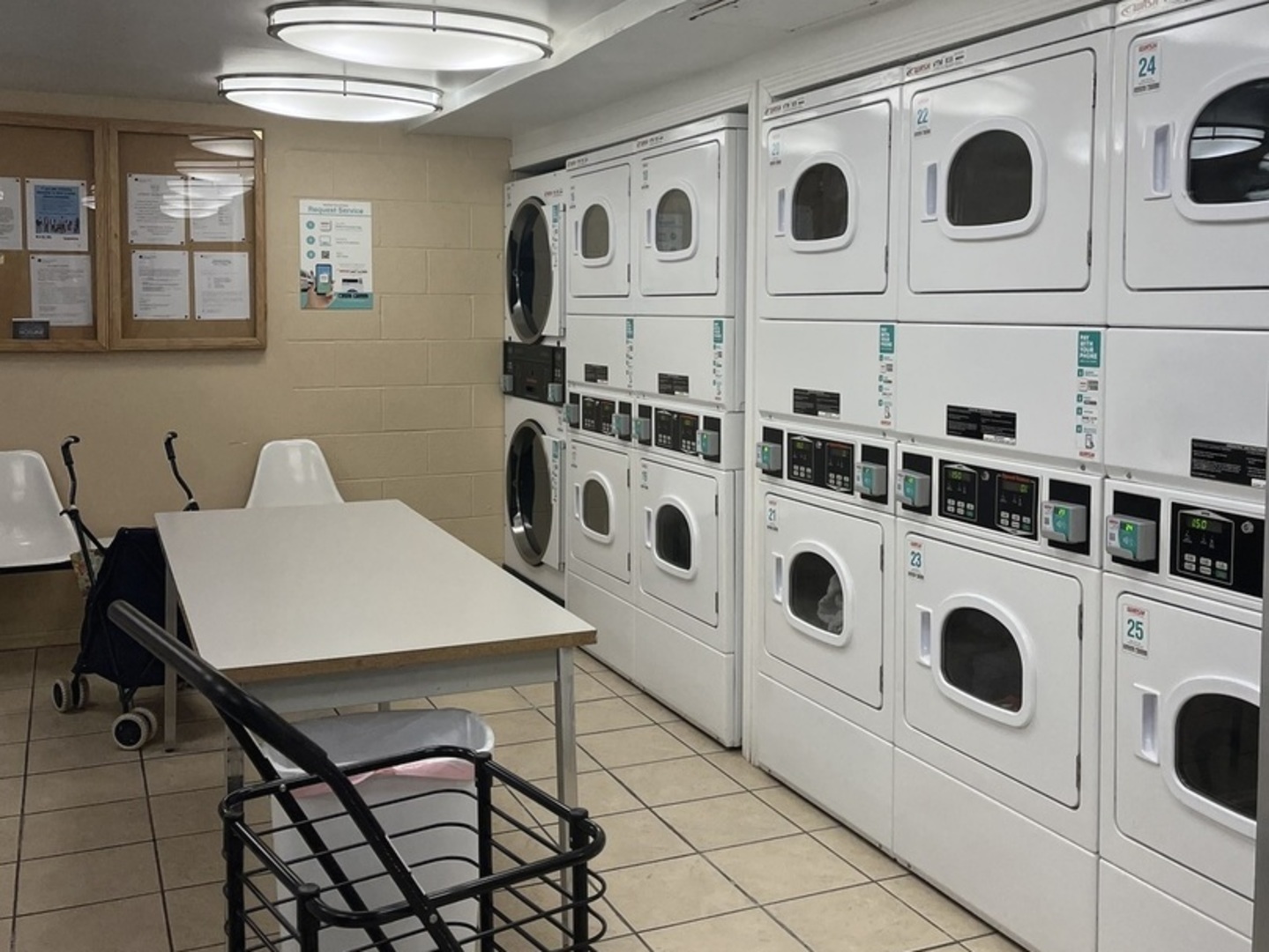 2605 South Indiana Avenue, Unit 301 Chicago, IL 60616 - Photo 21 of 23 a utility room with multiple dryer and washer