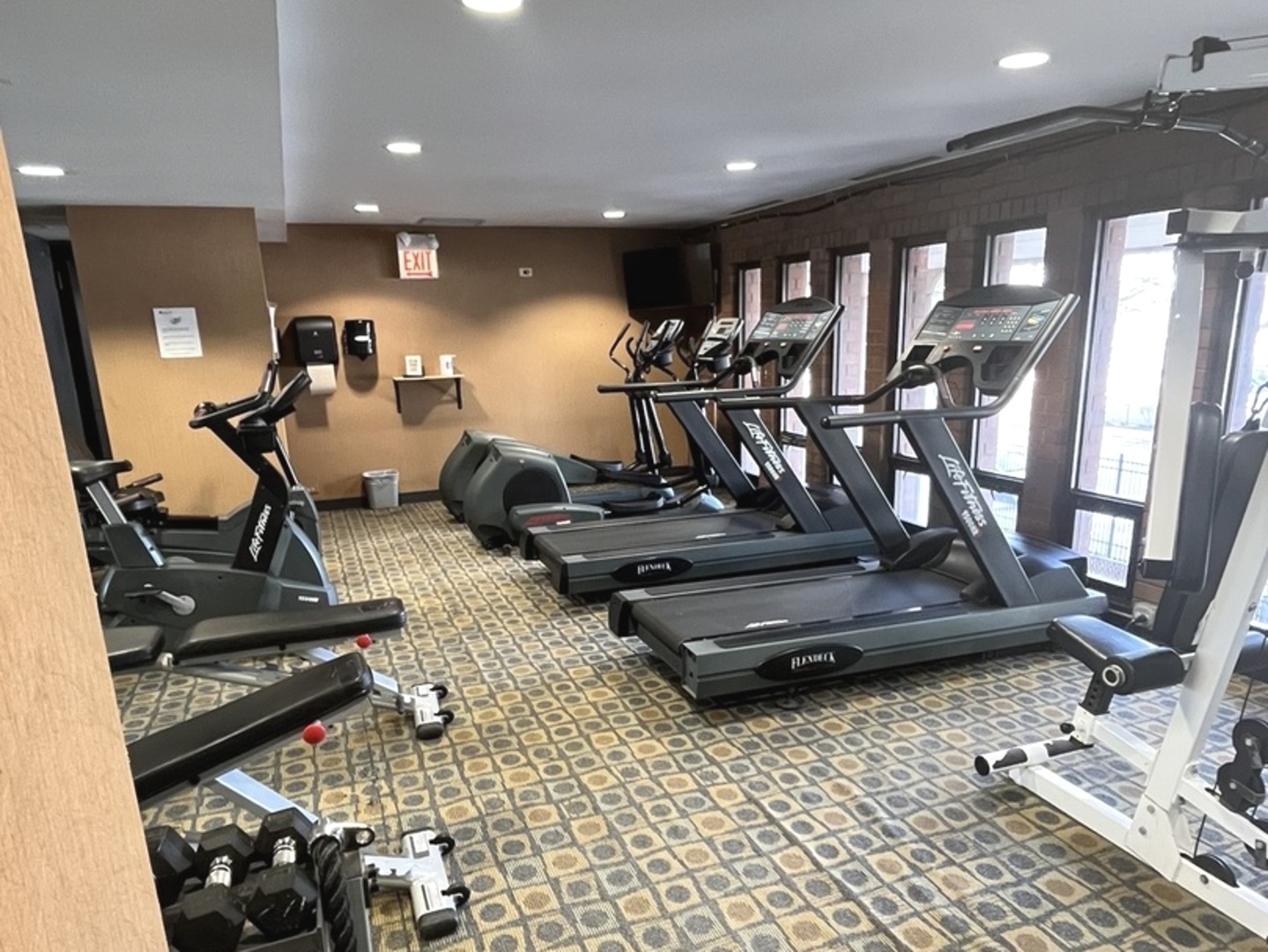 2605 South Indiana Avenue, Unit 301 Chicago, IL 60616 - Photo 23 of 23 a room with gym equipment and a large window
