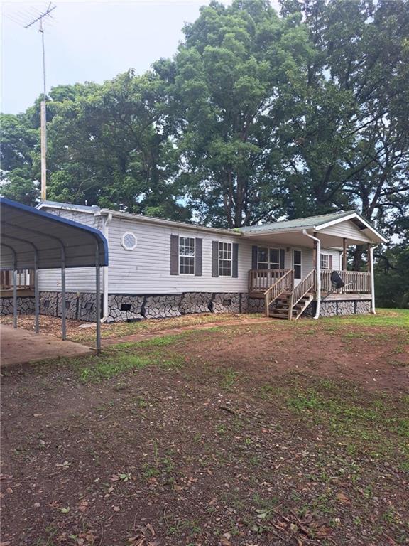 749 Chambers Road Commerce, GA 30530 - Photo 2 of 13 a front view of a house with a yard