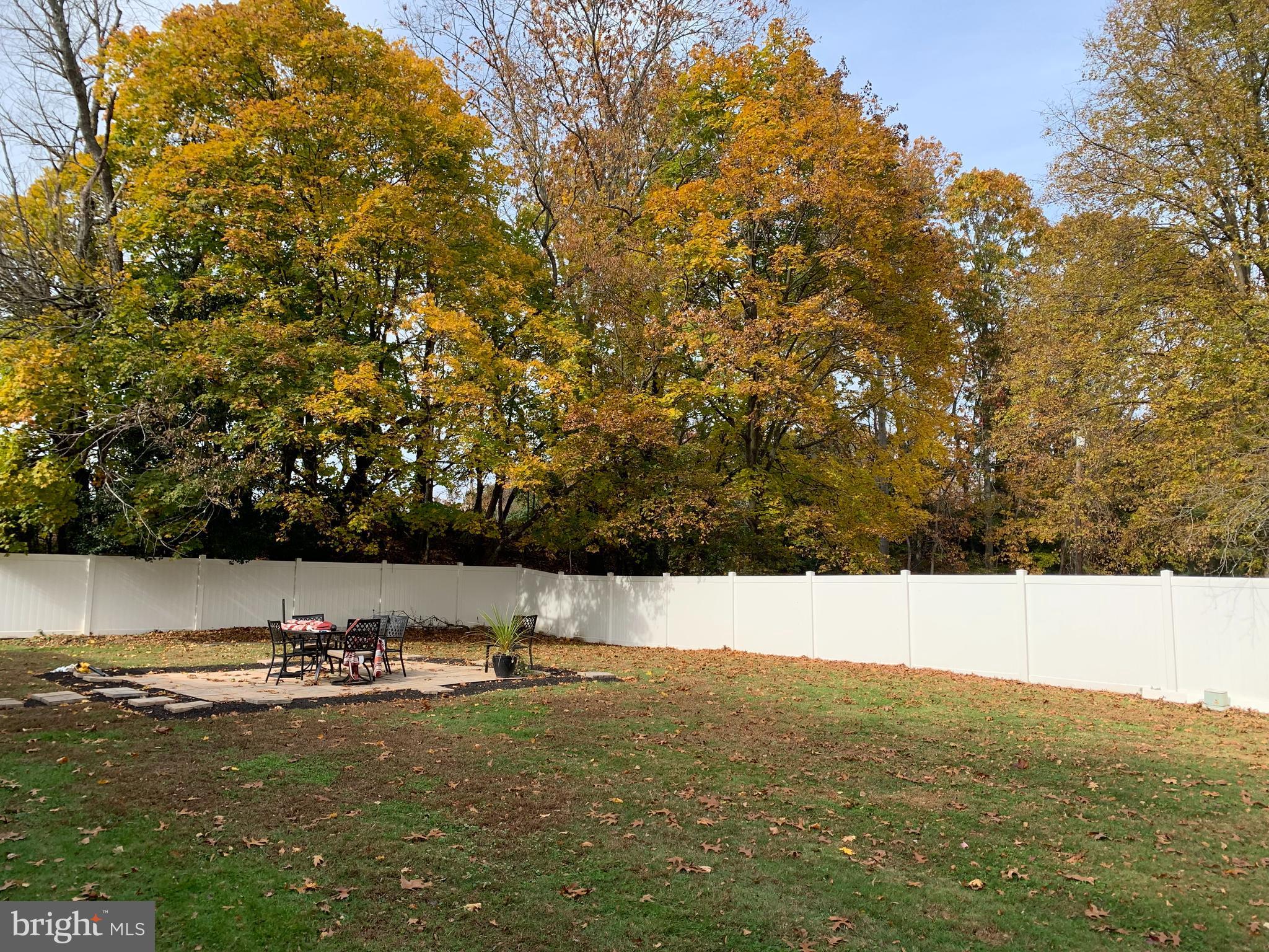 271 Princeton Hightstown Road Princeton Junction, NJ 08550 - Photo 26 of 44 Fenced in backyard with stone paved patio
