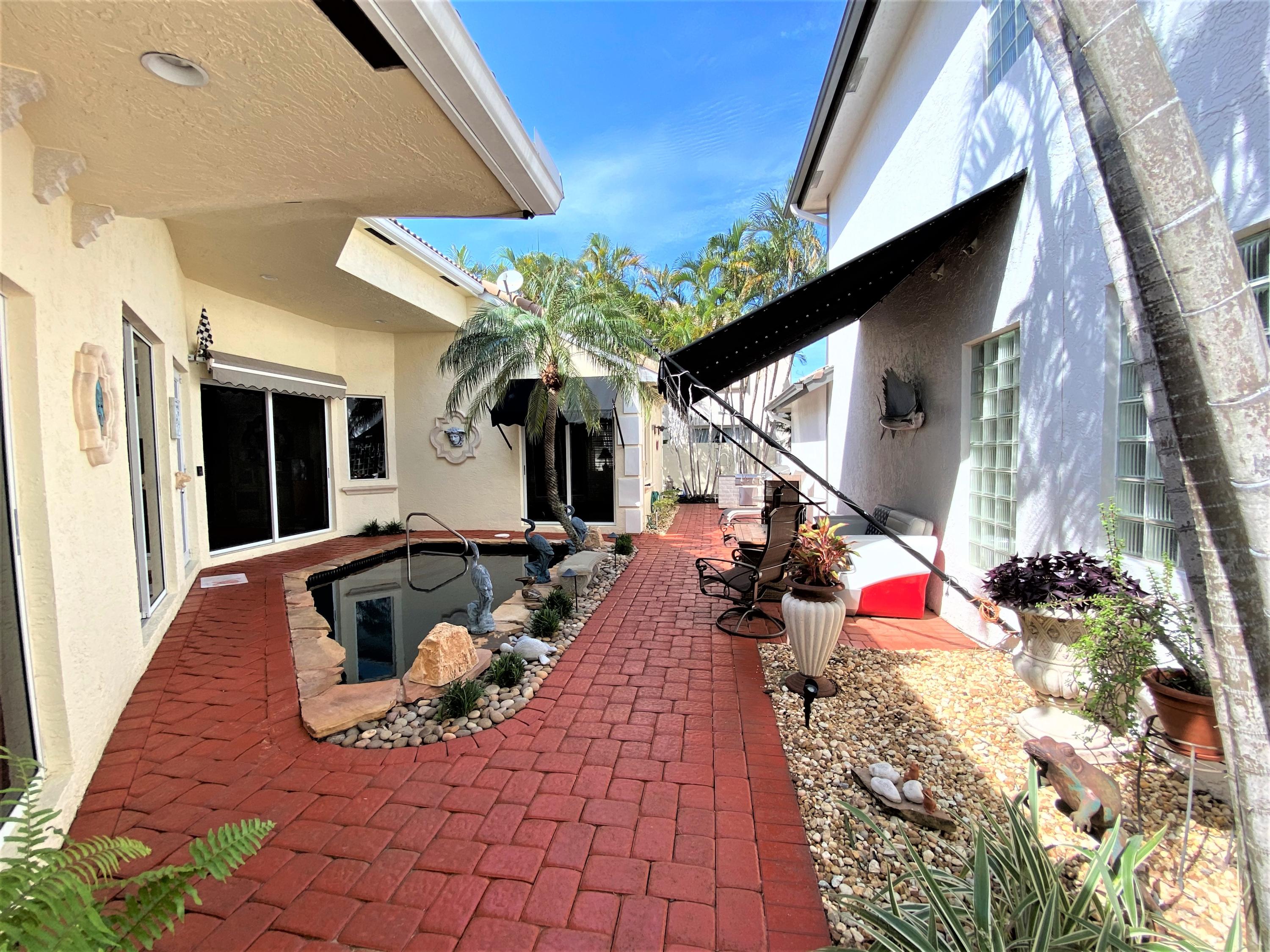 3555 Commodore Circle Delray Beach, FL 33483 - Photo 7 of 34 POOL AREA
