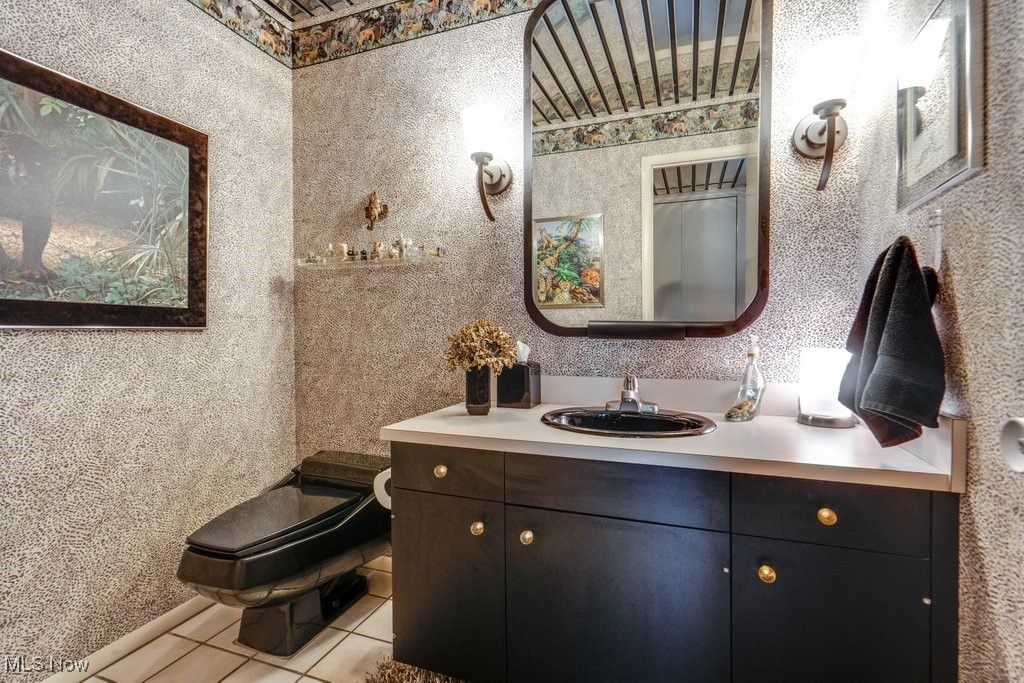 3404 South Smith Road Fairlawn, OH 44333 - Photo 32 of 37 Another view of the Half bathroom with tiled floor flooring and cherry vanity