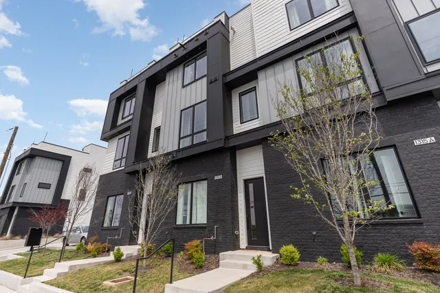 a street sign on a brick building