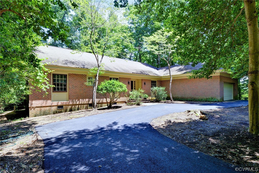 102 Lake Drive Williamsburg, VA 23185 - Photo 2 of 25 a view of a outdoor space with porch and furniture