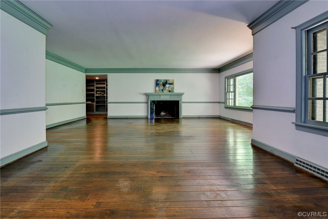 102 Lake Drive Williamsburg, VA 23185 - Photo 7 of 25 a living room with furniture and a fireplace