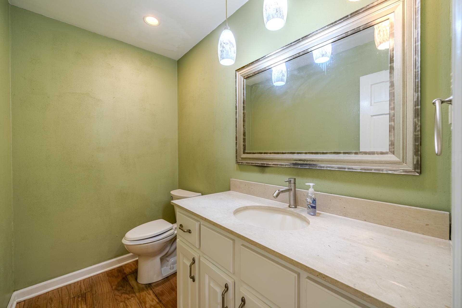 101 Bob Street Selmer, TN 38375 - Photo 13 of 40 a bathroom with a sink and a mirror