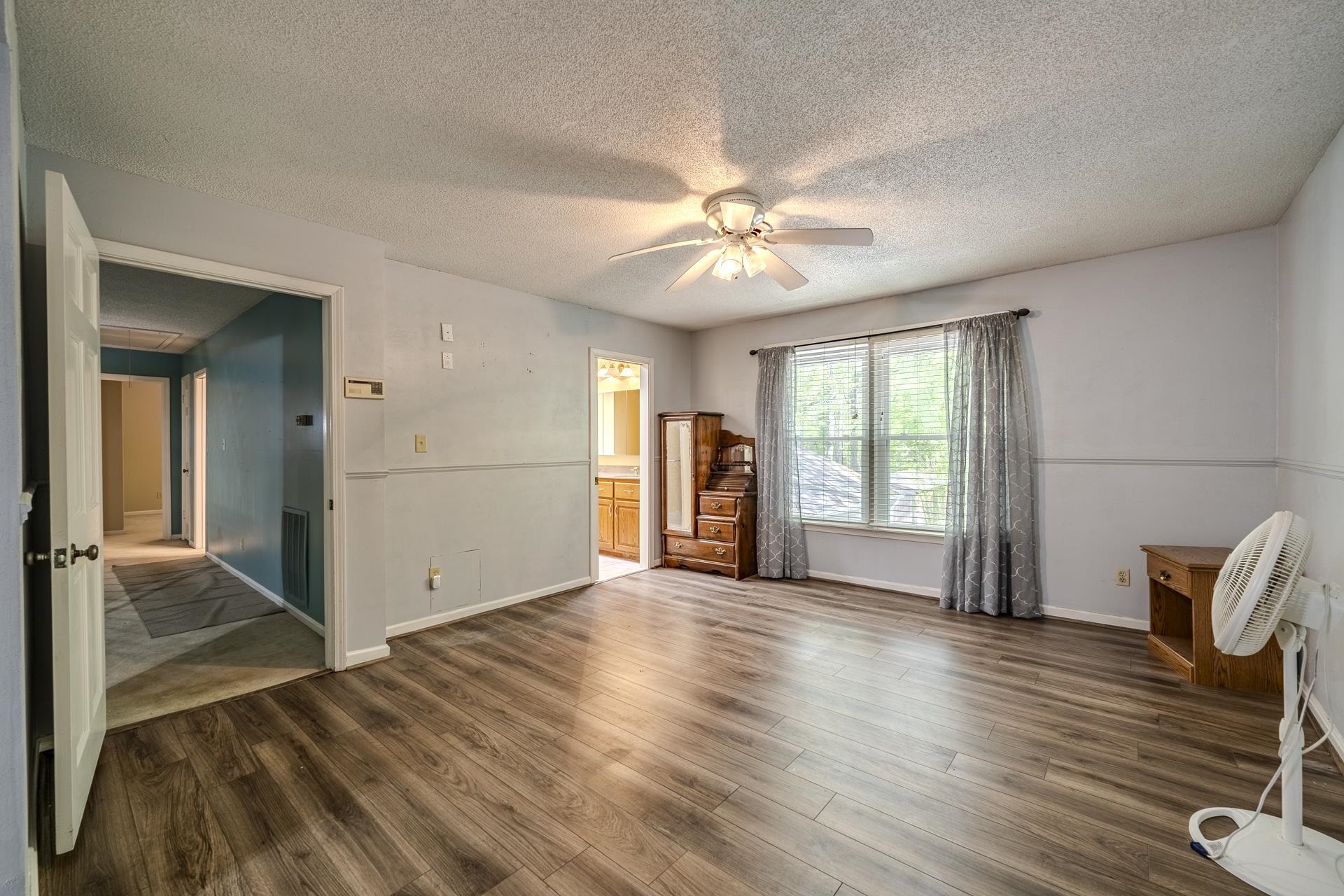 101 Bob Street Selmer, TN 38375 - Photo 18 of 40 a view of an empty room with a window