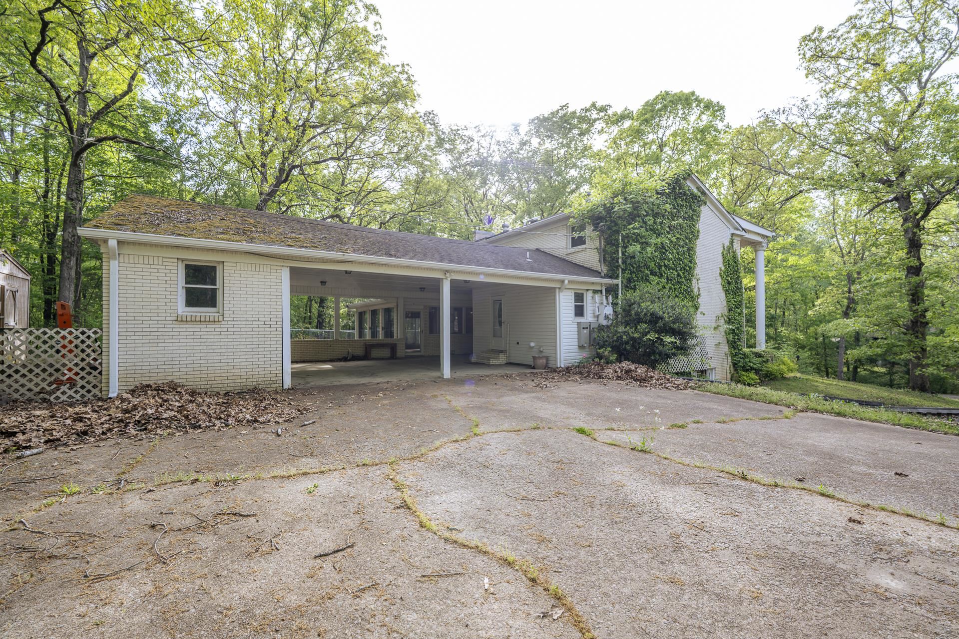 101 Bob Street Selmer, TN 38375 - Photo 36 of 40 front view of a house with a trees