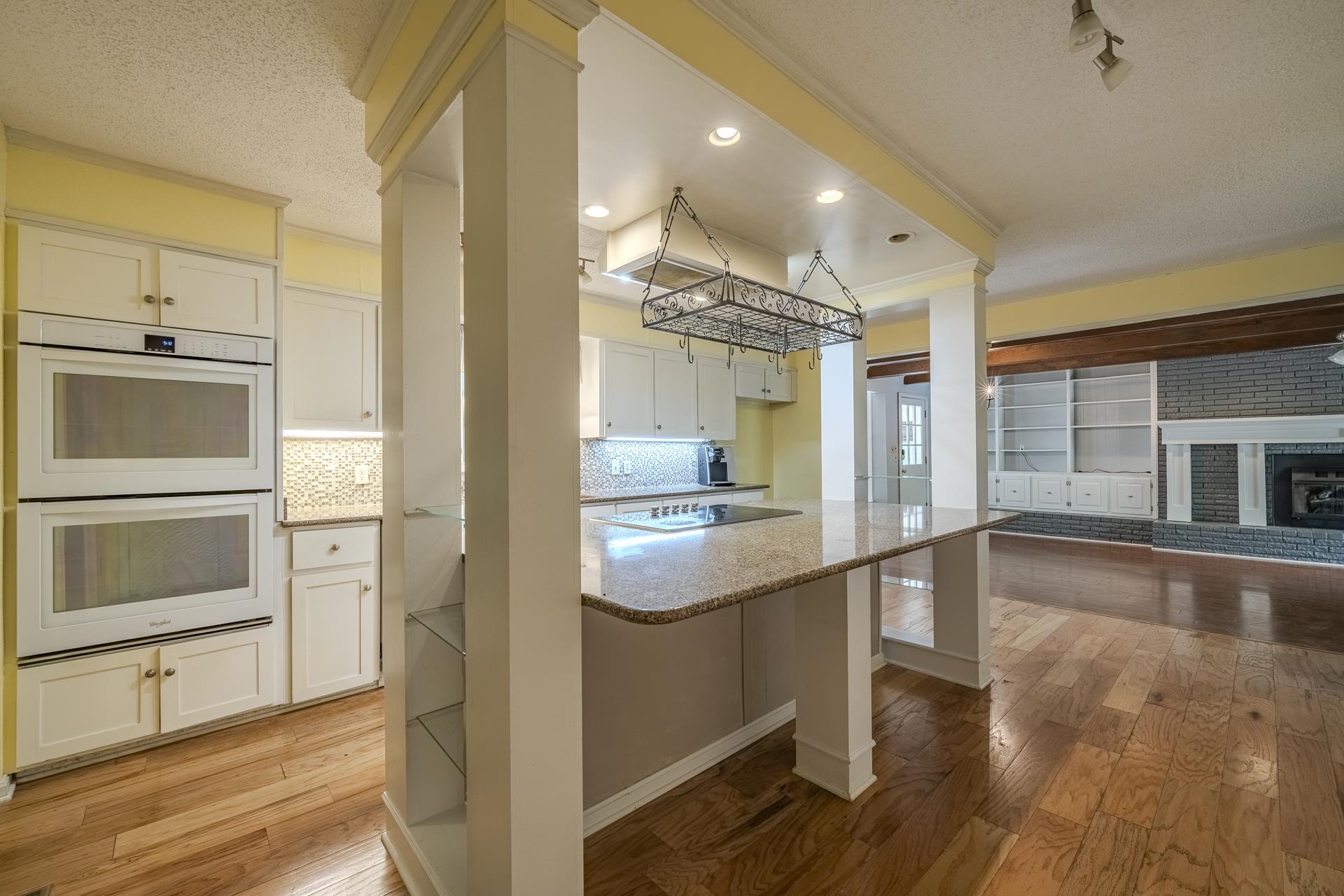 101 Bob Street Selmer, TN 38375 - Photo 8 of 40 a kitchen with stainless steel appliances granite countertop a stove and a refrigerator