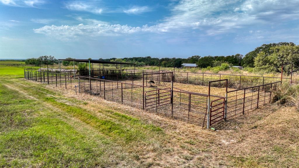 3810 Fairview Road Millsap, TX 76066 - Photo 20 of 25 a view of a lake with houses in the back