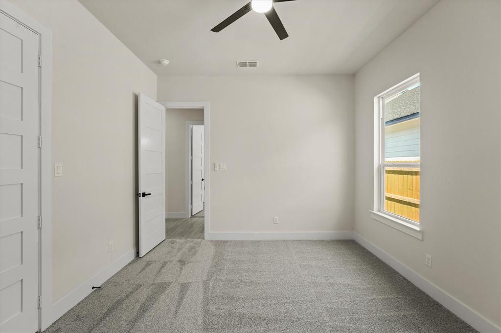 4020 Ranger Drive Dallas, TX 75212 - Photo 22 of 28 an empty room with a empty space and windows
