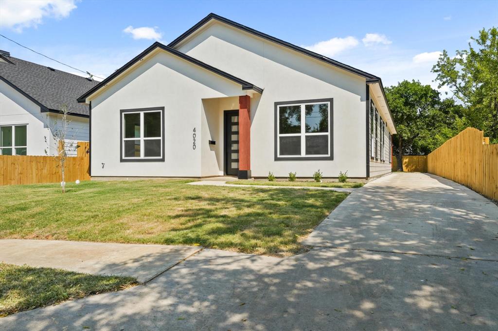 4020 Ranger Drive Dallas, TX 75212 - Photo 3 of 28 a front view of a house with a yard