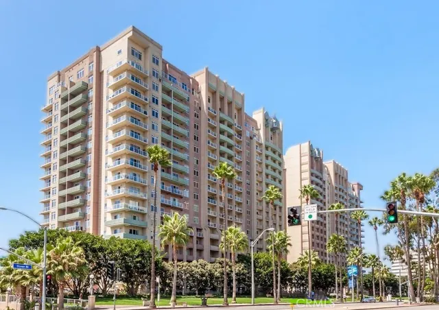 a view of a building with a yard