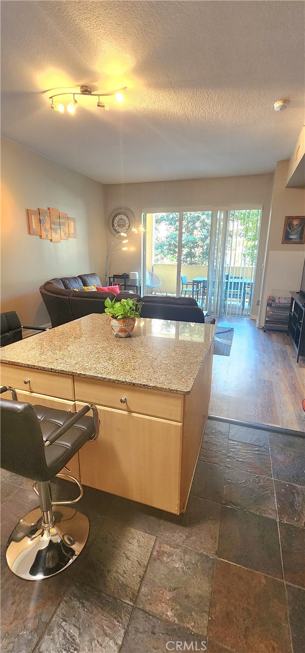 388 East Ocean Boulevard, Unit 206 Long Beach, CA 90802 - Photo 11 of 43 a living room with hard wood flooring and furniture
