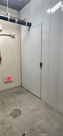 a view of a swimming pool with an outdoor seating and deck