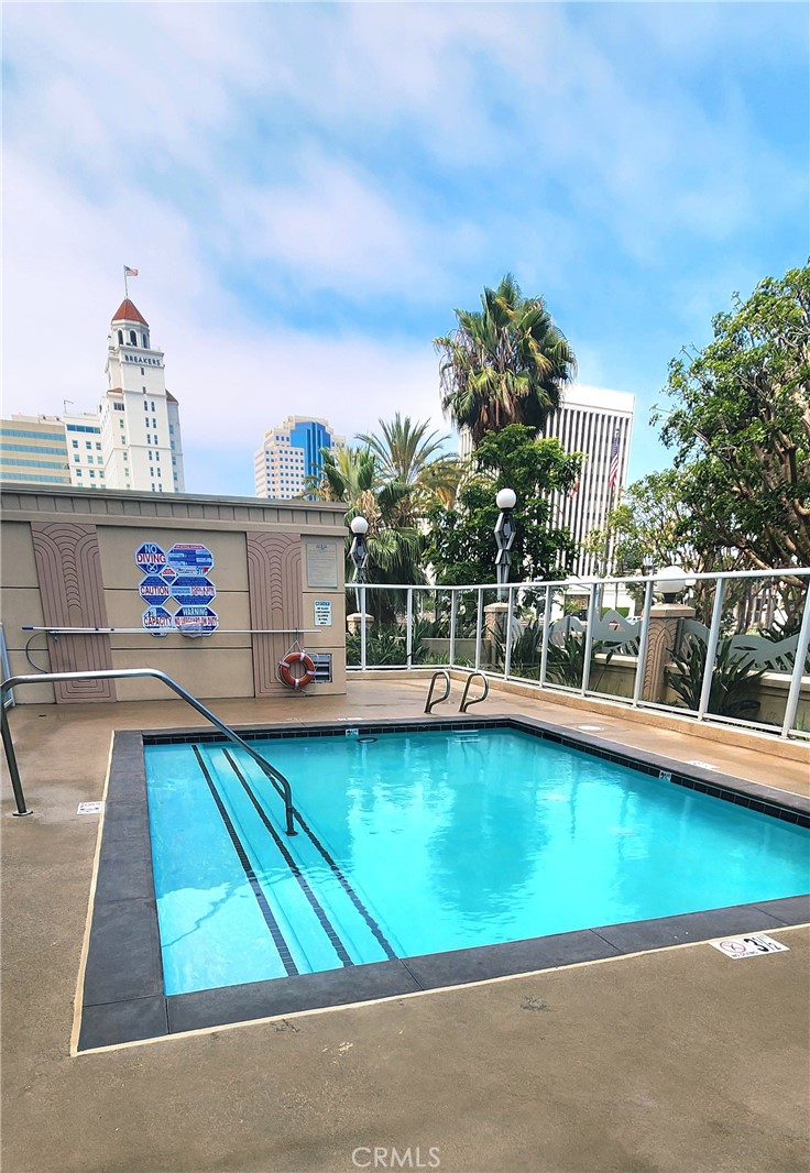 388 East Ocean Boulevard, Unit 206 Long Beach, CA 90802 - Photo 24 of 43 a view of a swimming pool with an outdoor seating and deck