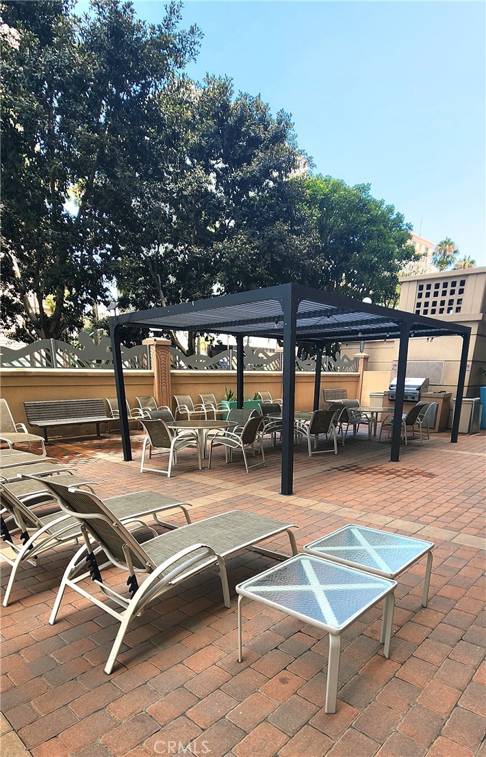 388 East Ocean Boulevard, Unit 206 Long Beach, CA 90802 - Photo 26 of 43 a outdoor space with patio lots of furniture and mountain view