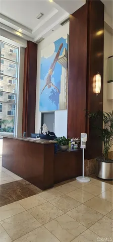 a view of a living room and entryway