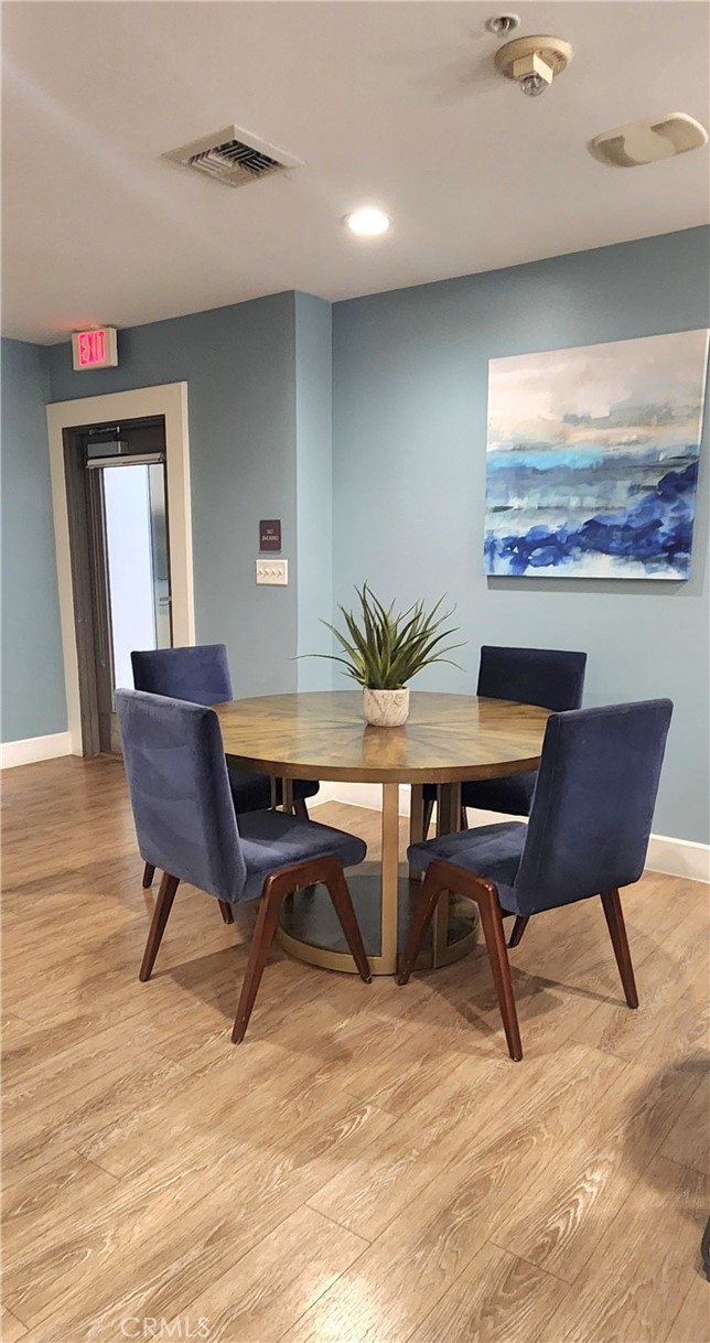 388 East Ocean Boulevard, Unit 206 Long Beach, CA 90802 - Photo 36 of 43 a workspace with furniture and a rug