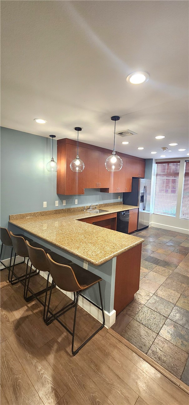 388 East Ocean Boulevard, Unit 206 Long Beach, CA 90802 - Photo 37 of 43 a room with wooden floor table tennis table