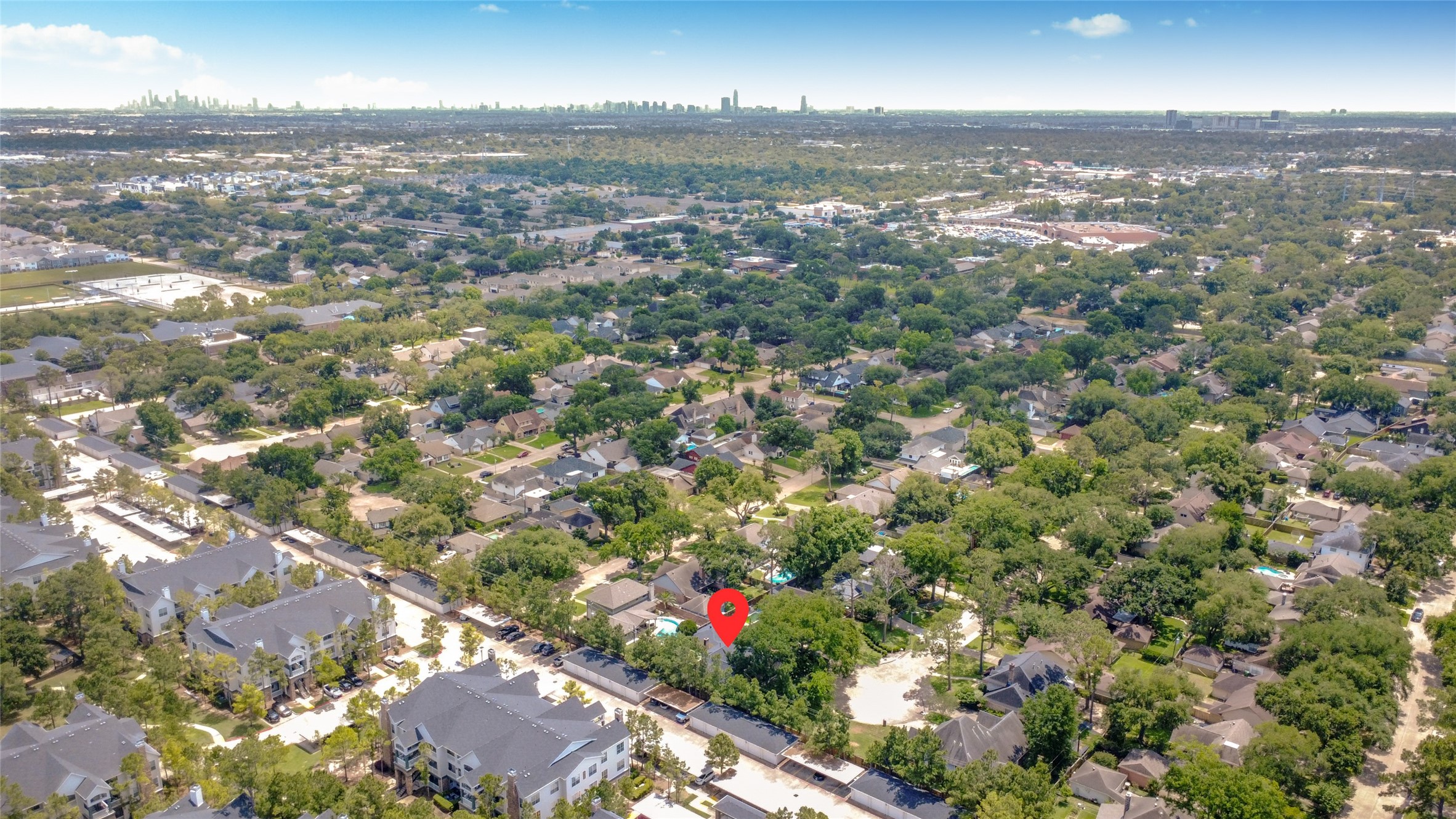 3030 Bernadette Lane Houston, TX 77043 - Photo 30 of 31 an aerial view of residential houses with city view