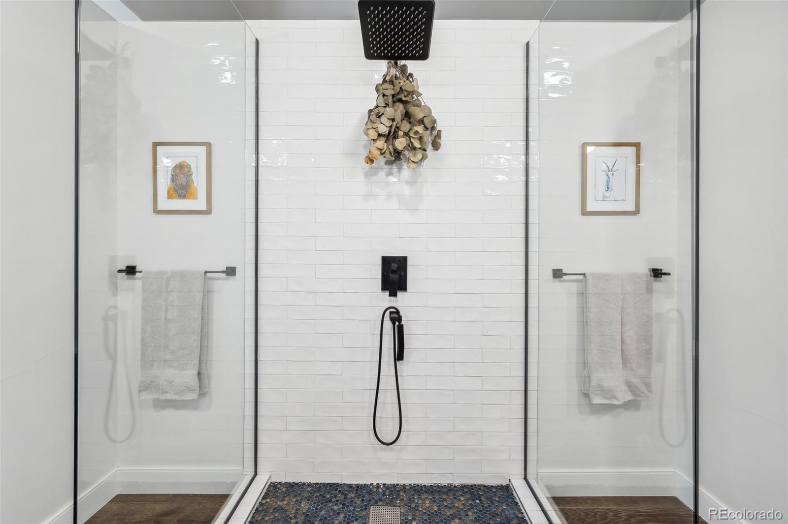 1323 Kalamath Street Denver, CO 80204 - Photo 26 of 40 a bathroom with a shower