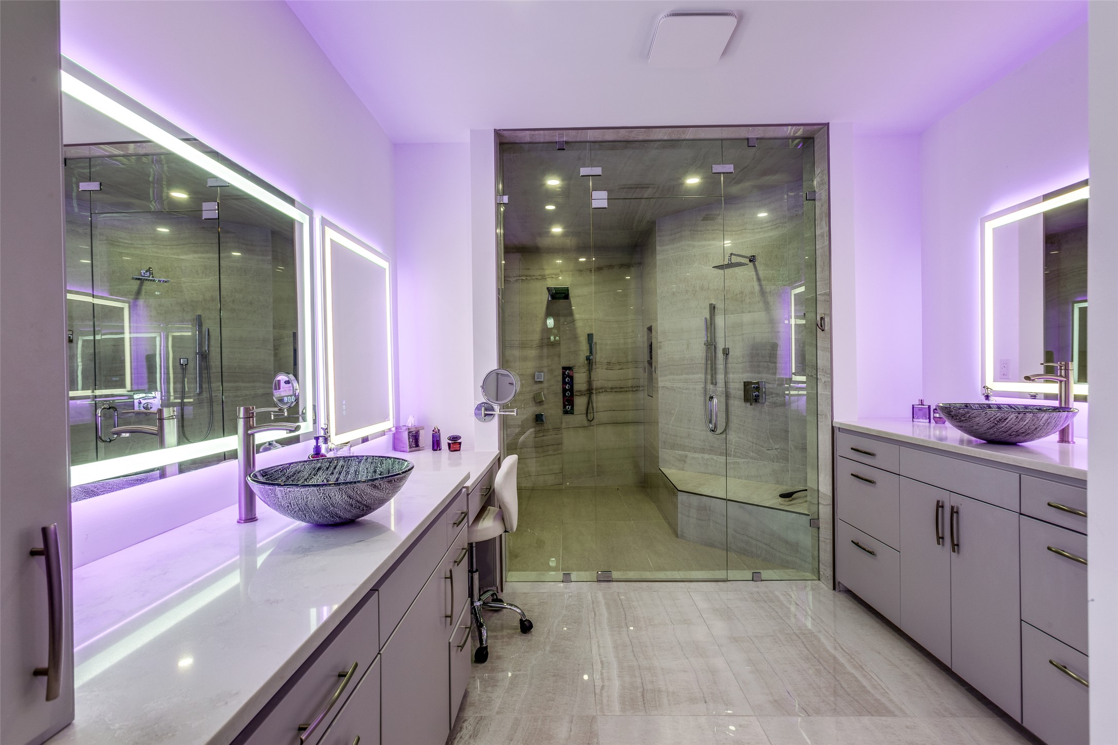 608 Innwood Drive Georgetown, TX 78628 - Photo 18 of 40 Master bath his and her sinks, spacious shower room with multiple shower heads and jets with commercial steam unit.